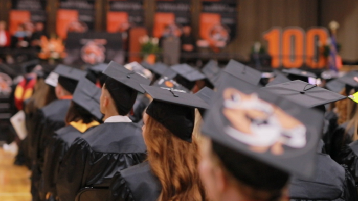 students walking into commencement at cowley college