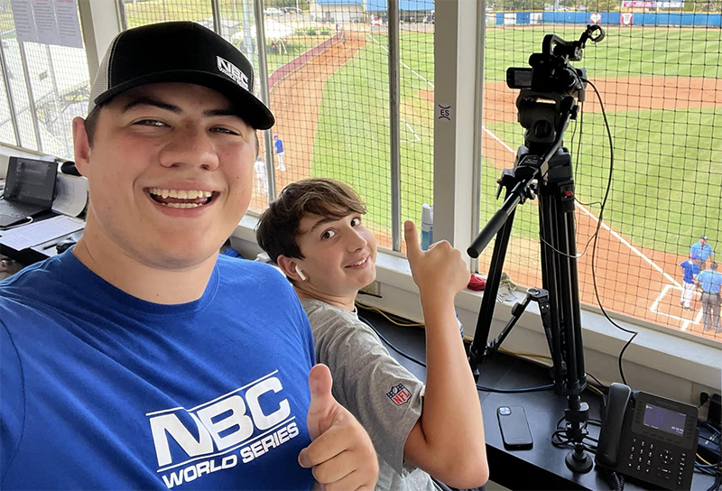 Student Andrew filming baseball