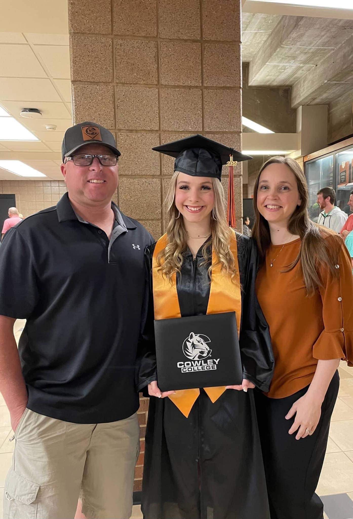 Maddie at Cowley Graduation with Parents
