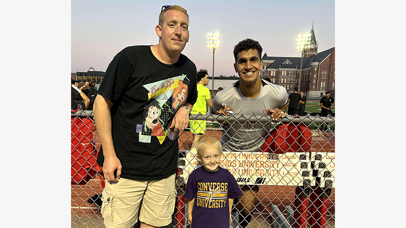 foster family with soccer player