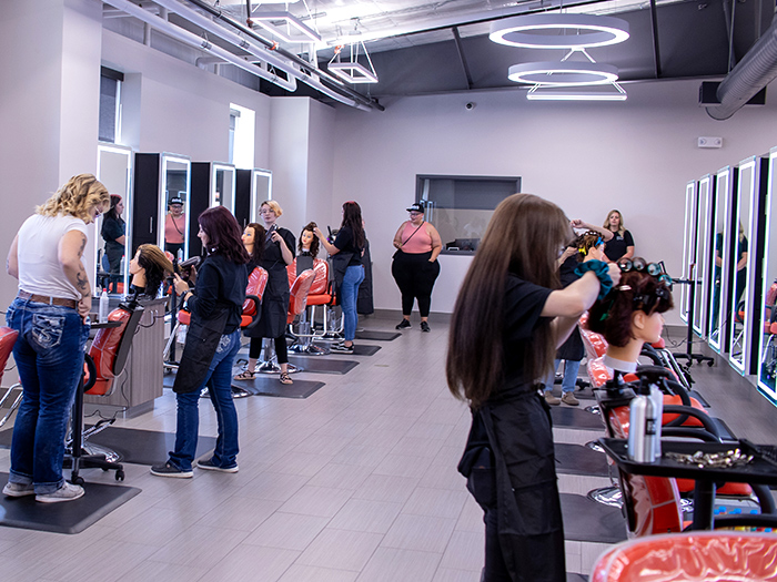 students cutting hair