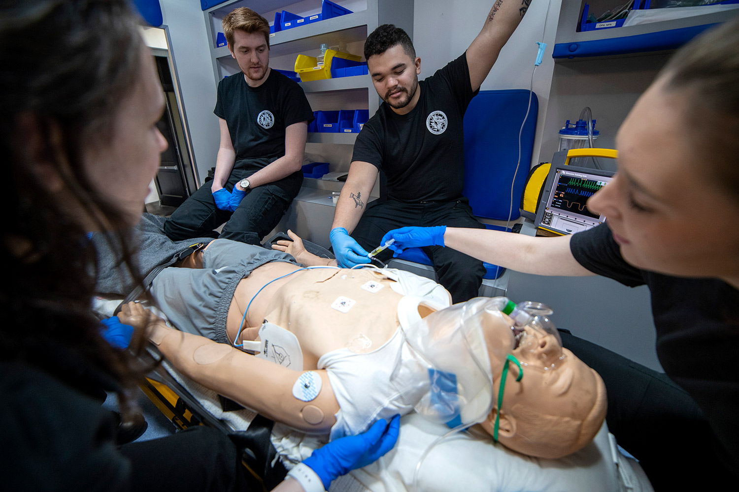 paramedic students practicing mobile intensive care