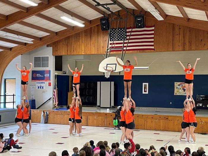 Cheer performing at Adams Elementary