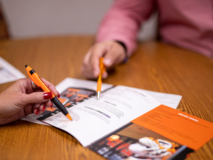 cowley advisor showing online courses to a student