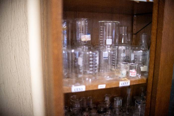 science beakers on shelf