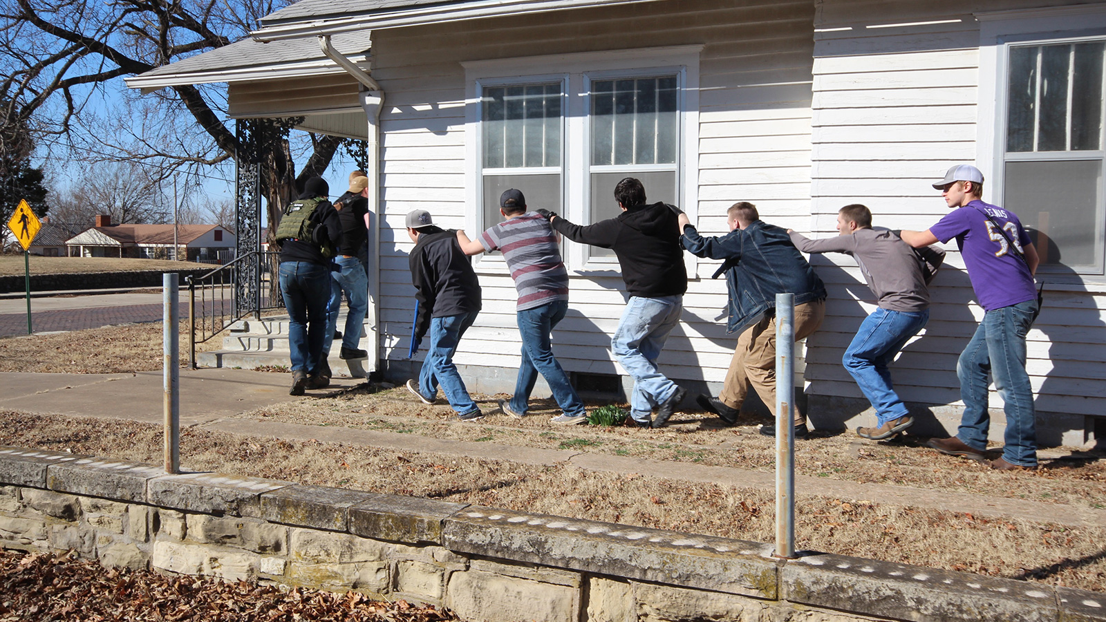 students practicing serving a warrant