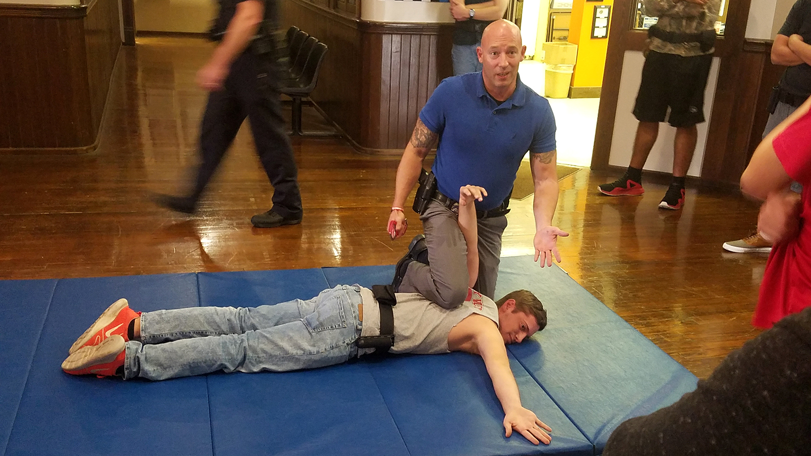 instructor teaching handcuffing