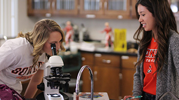 Two students in a science lab 